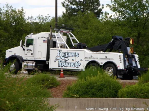 Close-up of a Keith's Towing heavy-duty wrecker truck