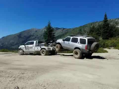 Keith's Towing 4x4 recovery truck on an off-road job